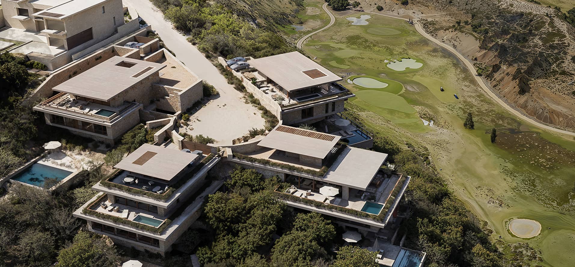 Aerial view of Las Brisas villas beside the Los Flamingos golf course
