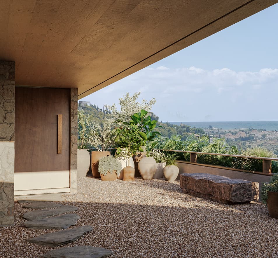 Stone entrance courtyard with Mediterranean views